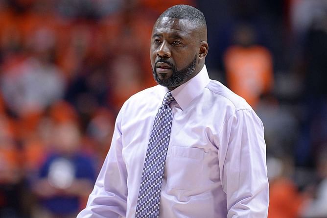 WATCH: Former Badger coach Howard Moore makes an emotional return to Kohl Center since losing his wife and daughter in a car crash