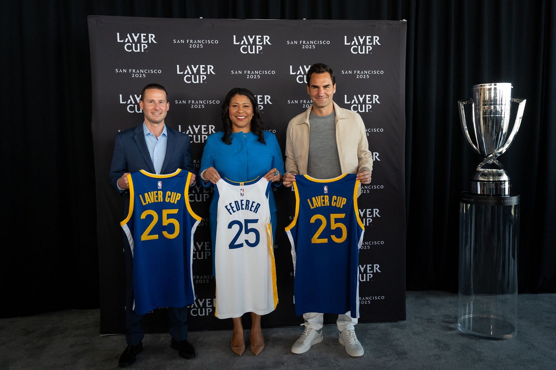 Roger Federer (R) with San Francisco Mayor London Breed (C)and Brandon Schneider at Chase Center, San Francisco, California.