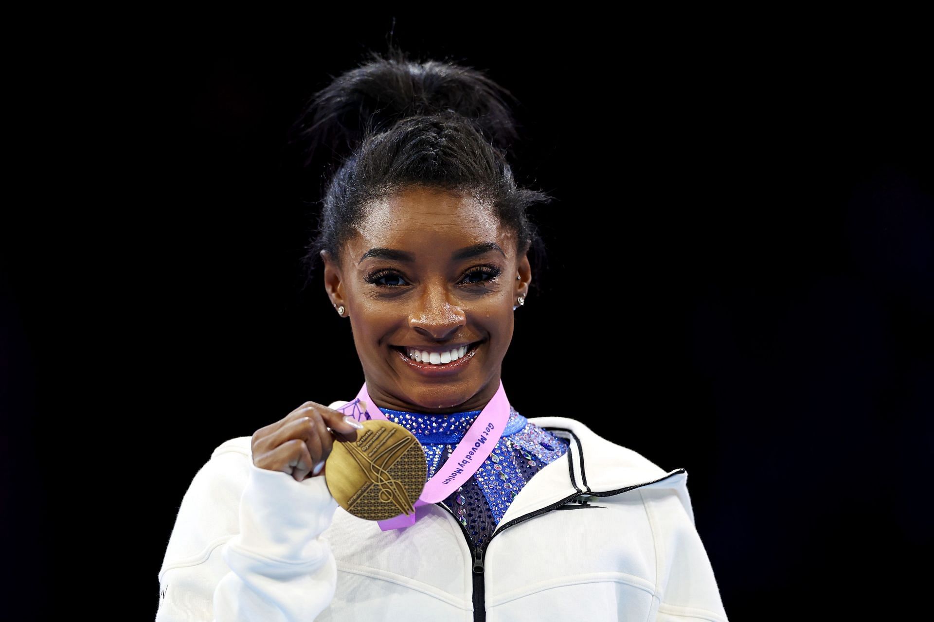 Simone Biles of Team United States poses for a photo during the medal ceremony for the Women&#039;s All-Around Final on Day Seven of the 2023 Artistic Gymnastics World Championships at Antwerp Sportpaleis in Antwerp, Belgium.