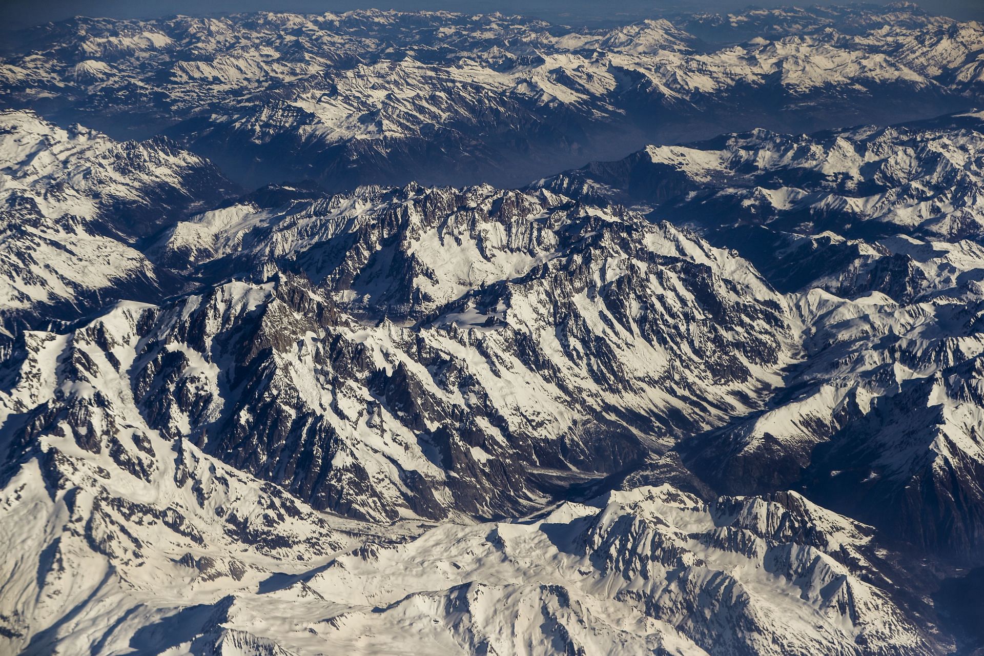 An aerial view of the Swiss Alps, where five members of the same family were found dead (Image via Getty)