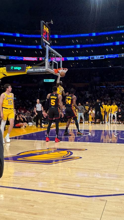 Braxton Berrios and Alix Earle's view of the Lakers' court