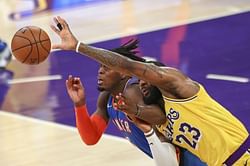 WATCH: LeBron James gets whacked in the back of his head by Lu Dort, refs don't call flagrant