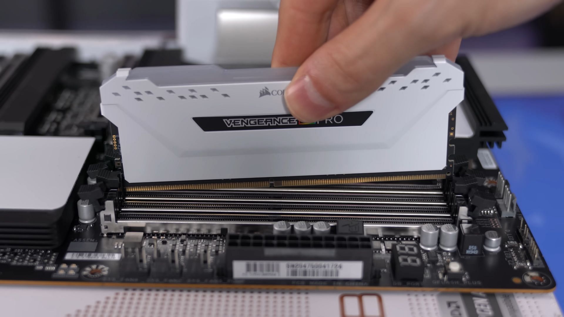 Installing RAM sticks (Image via TechSource/YouTube)