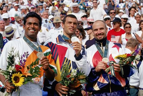 Andre Agassi celebrates the gold