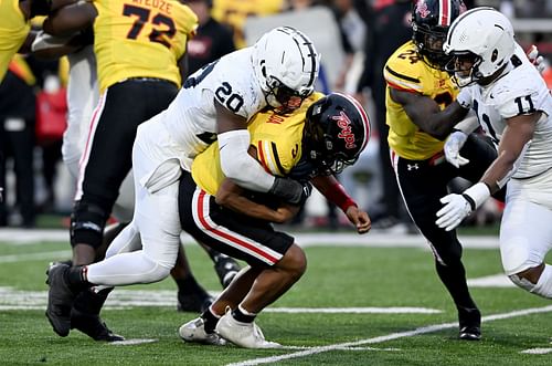 Adisa Isaac #20 of the Penn State Nittany Lions sacks Taulia Tagovailoa #3 of the Maryland Terrapin