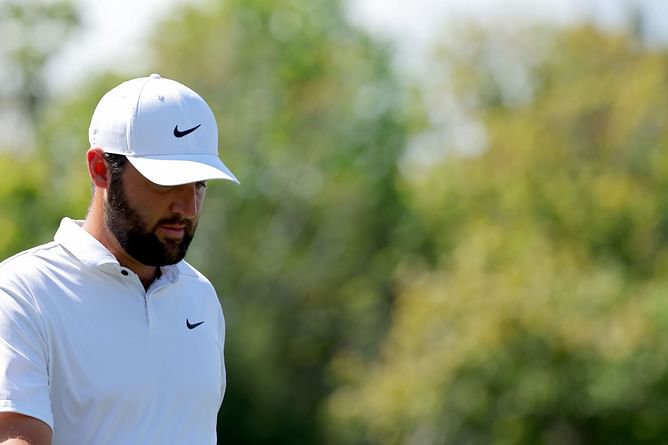 Scottie Scheffler holes in an incredible Eagle to cut the lead at the top of The Players Championship leaderboard
