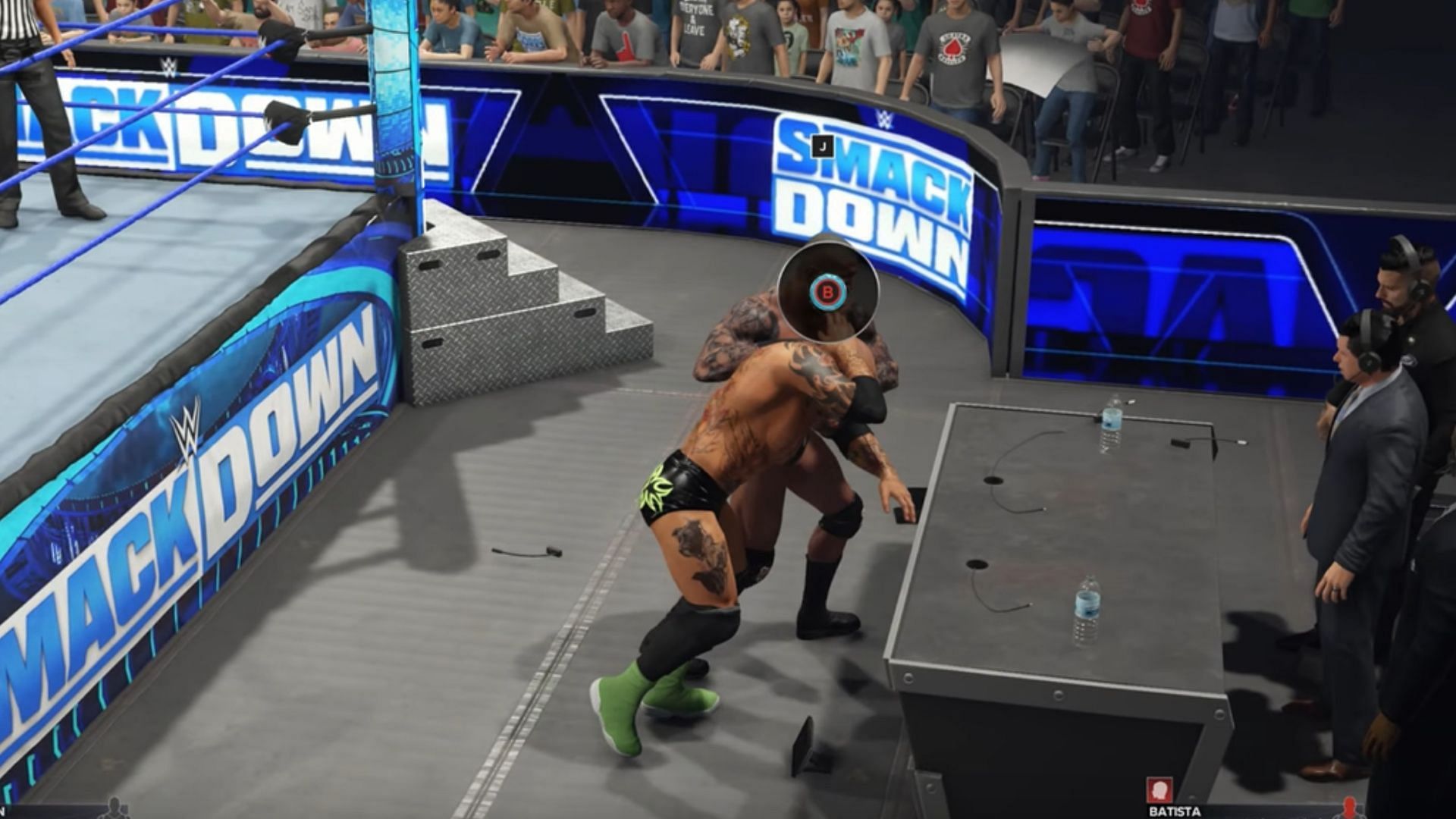 Lean your opponent on the announce table (Image via YouTube/Gameskeys)