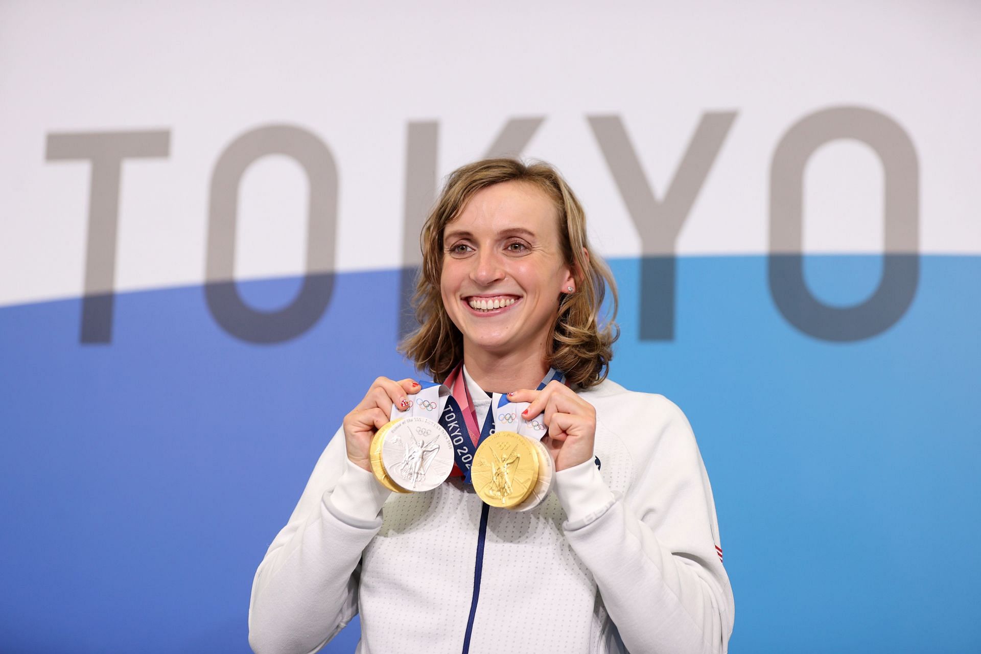 Katie Ledecky of Team USA poses with her two Gold and two Silver medals after a press conference to the media during the Tokyo Olympic Games on July 31, 2021, in Tokyo, Japan. (Photo by Laurence Griffiths/Getty Images)