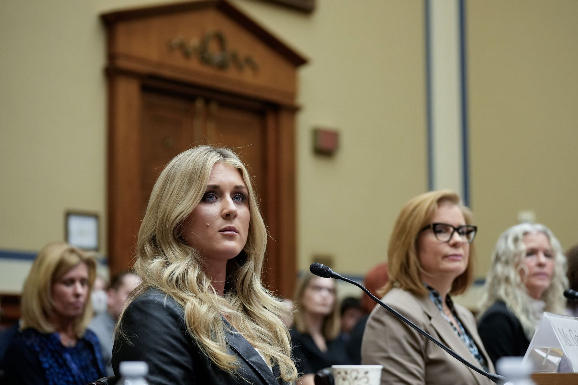Riley Gaines (L) testifies during a House Oversight Subcommittee on Health Care and Financial Services hearing on Capitol Hill. (Photo by Drew Angerer/Getty Images)