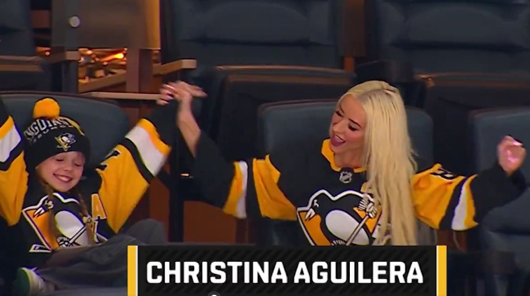 WATCH: Crosby-jersey donned Christina Aguilera attends Penguins game with daughter Summer