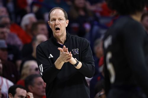 Mike Hopkins on the sideline for the Washington Huskies