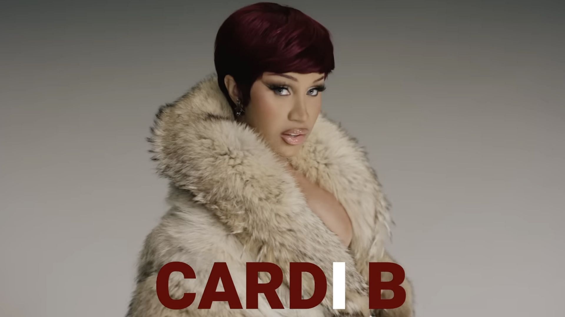 Cardi B performing in the music video for her new single 