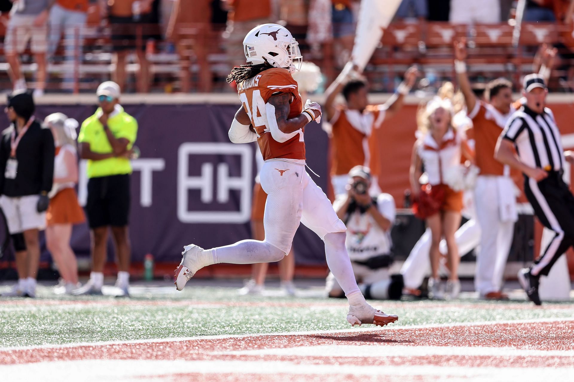 Jonathon Brooks #24 of the Texas Longhorns rushes for a touchdown in the third quarter against the Kansas Jayhawks