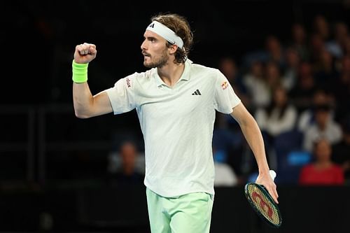 Stefanos Tsitsipas celebrates after winning a point at the Australian Open 2024