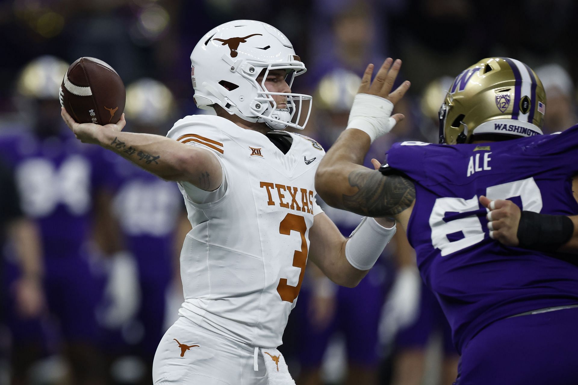 NEW ORLEANS, LOUISIANA, JANUARY 01: Quinn Ewers #3 of the Texas Longhorns throws a pass during the first quarter against the Washington Huskies during the CFP Semifinal Allstate Sugar Bowl at Caesars Superdome on January 1, 2024, in New Orleans, Louisiana. (Photo by Chris Graythen/Getty Images)
