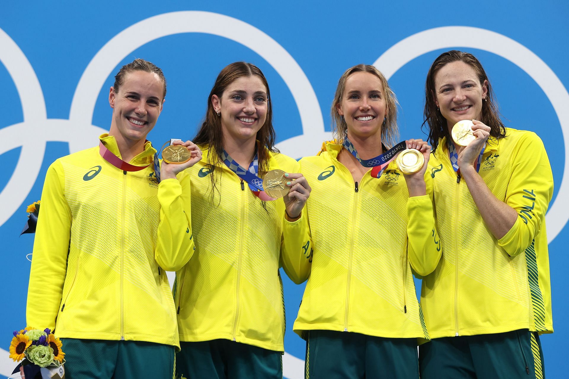 Bronte Campbell, Meg Harris, Emma Mckeon and Cate Campbell of Team Australia pose after winning the gold medal in the Women&#039;s 4 x 100m Freestyle Relay Final at the Tokyo 2020 Olympic Games. (Photo by Clive Rose/Getty Images)