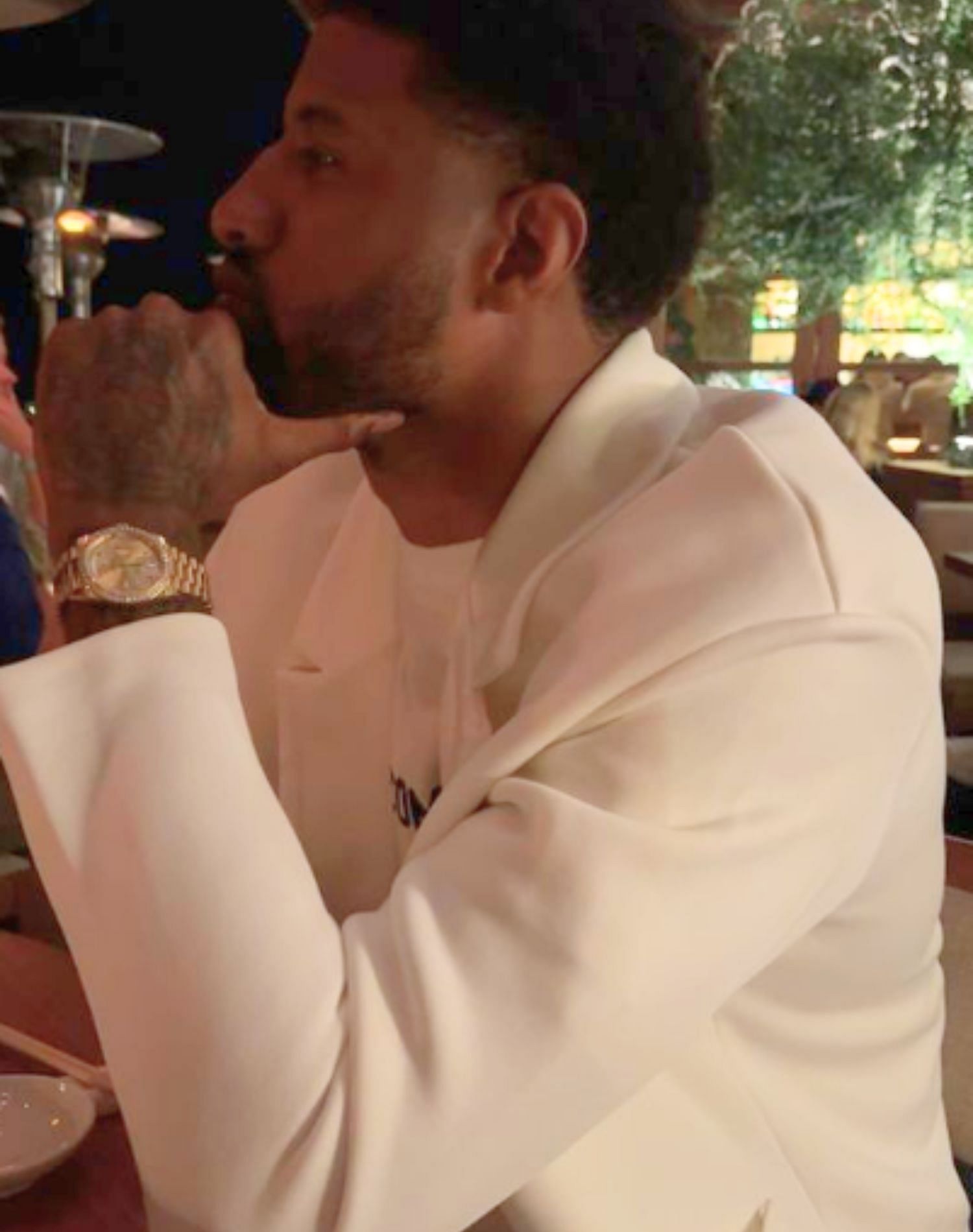 Paul George wearing his expensive Rolex watch in a recent date night with his wife.