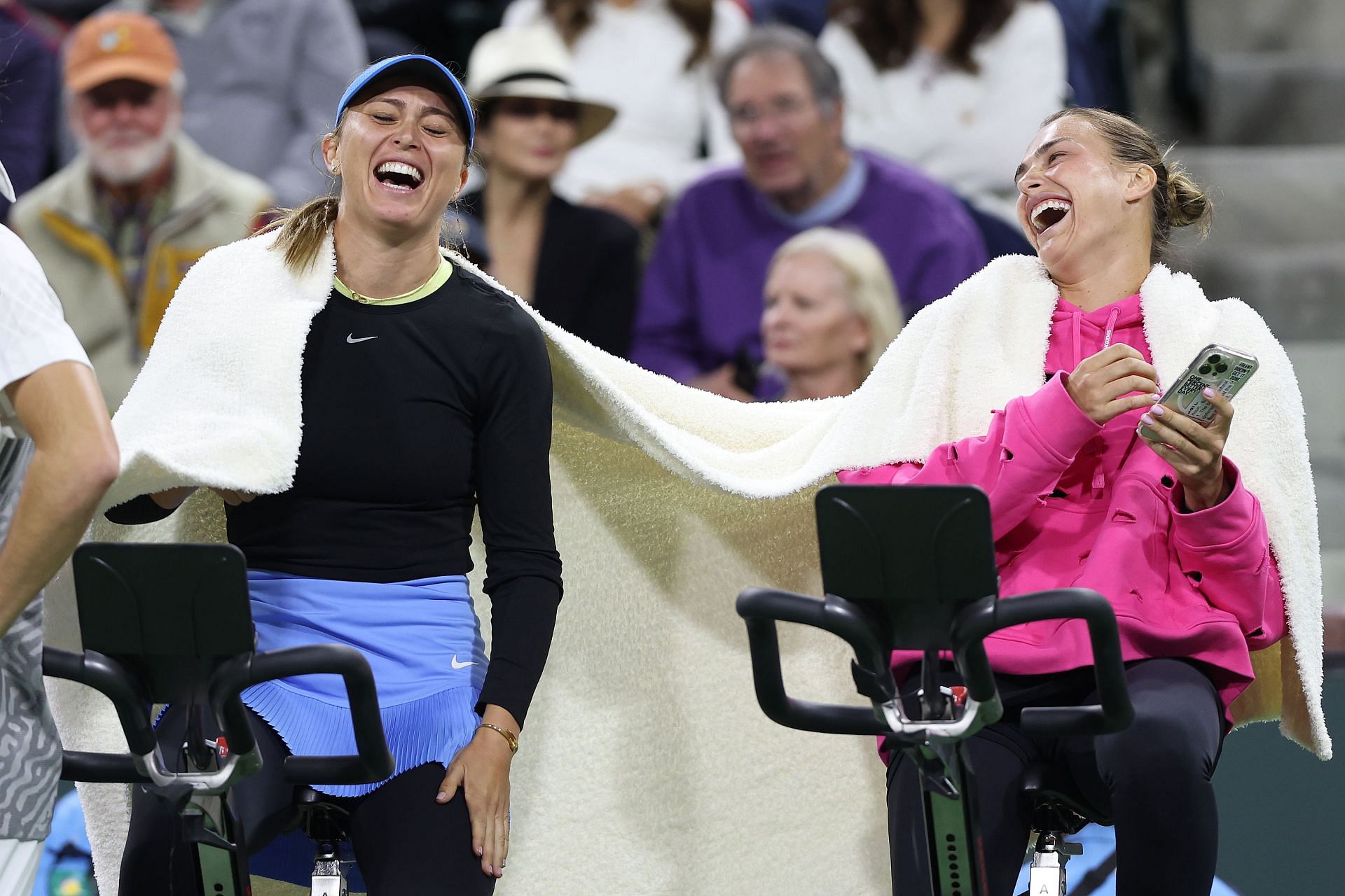 Paula Badosa (L) and Aryna Sabalenka share a laugh.