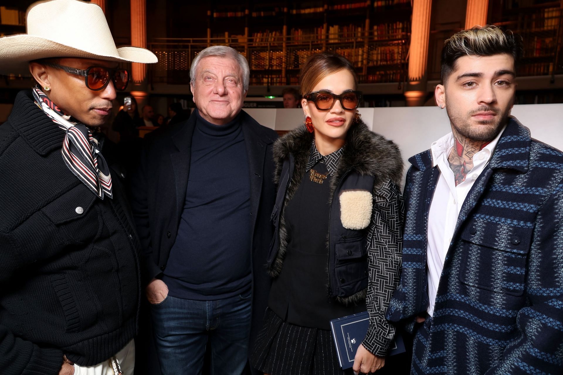 (L-R) Pharrell Williams, Sidney Toledano, Rita Ora and Zayn Malik attend the Kenzo Menswear Fall/Winter 2024-2025 in Paris, France. (Photo by Pascal Le Segretain/Getty Images)