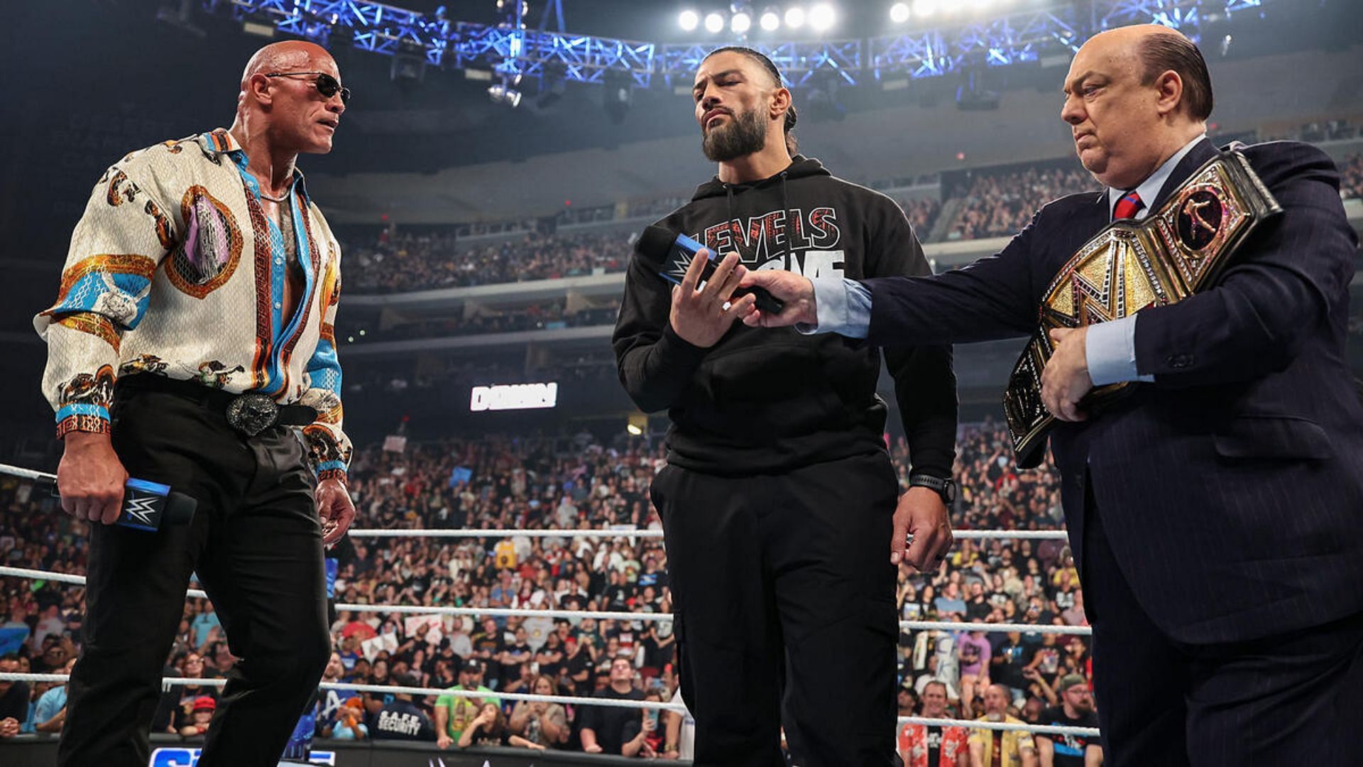 The Rock, Roman Reigns, and Paul Heyman are Bloodline members