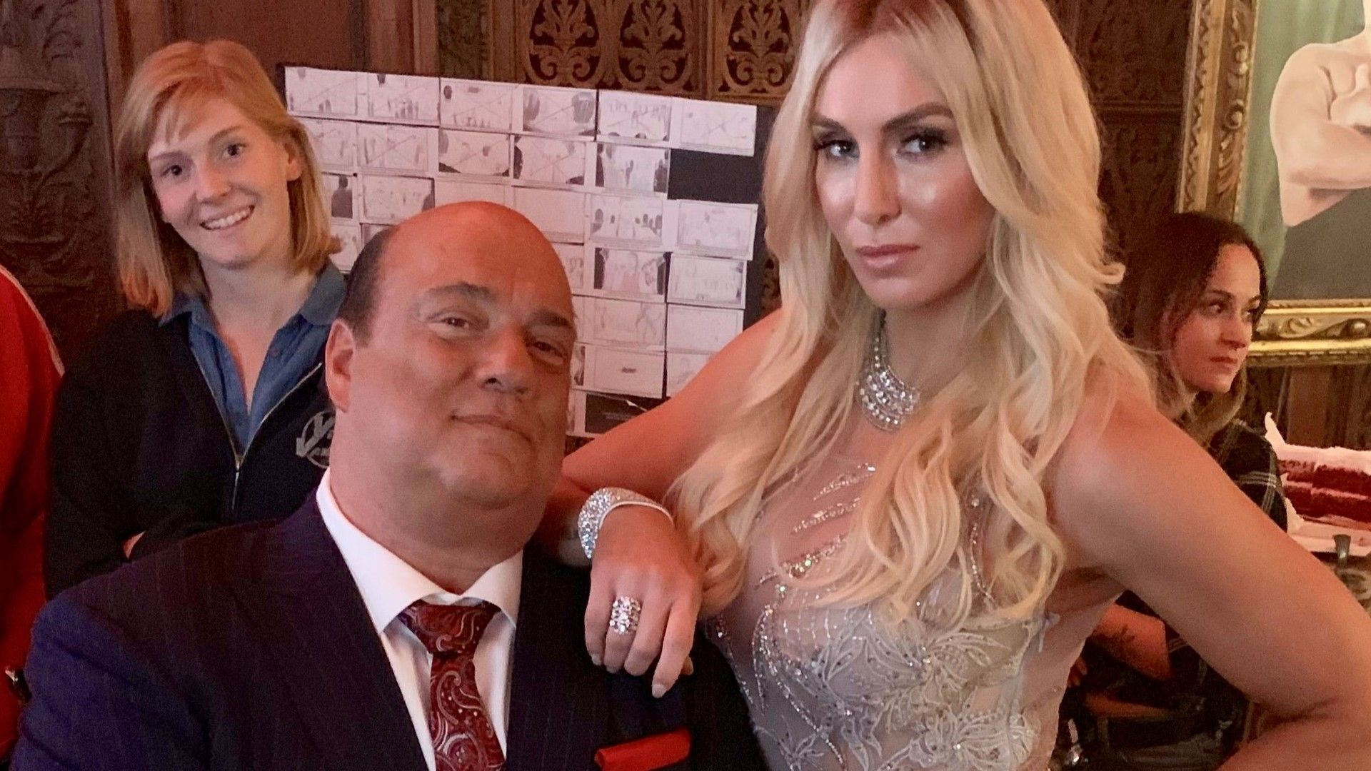 Paul Heyman and Charlotte Flair pose together