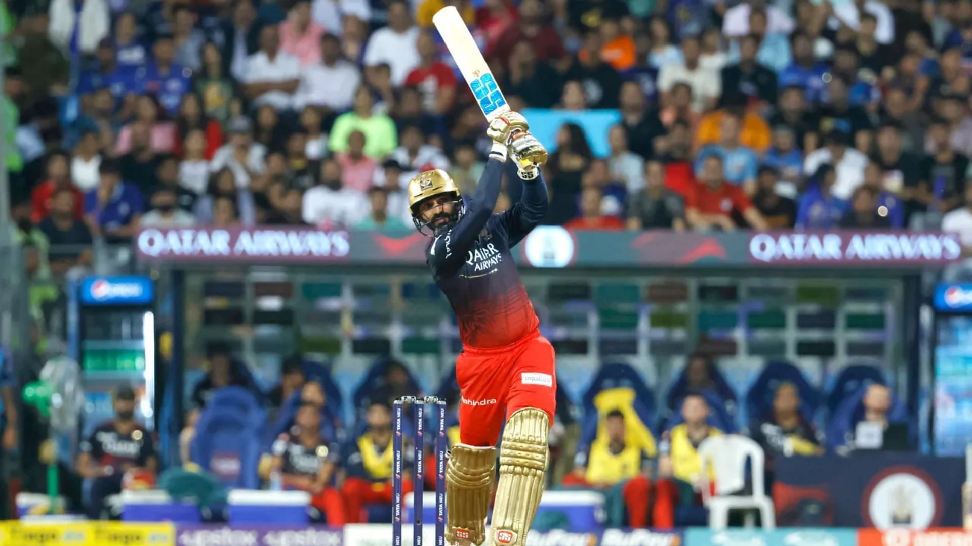 Dinesh Karthik in action during IPL 2023 against MI