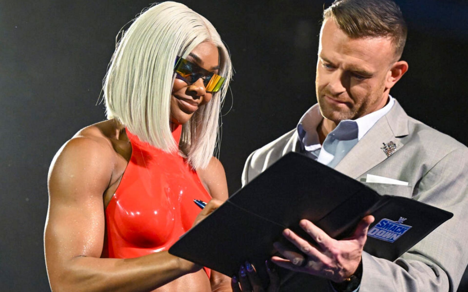 Jade Cargill signing the SmackDown contract