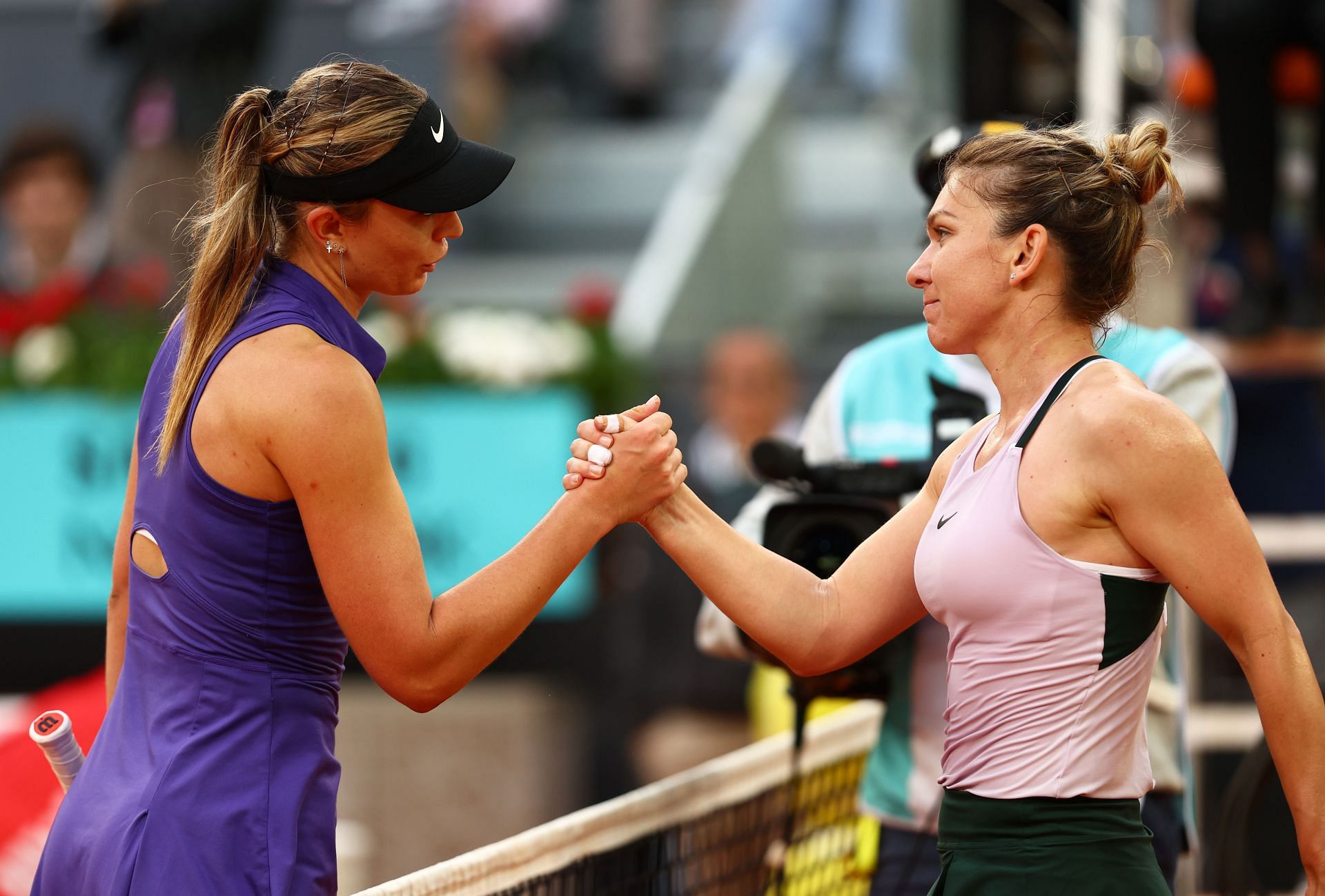 Badosa (L) and Halep pictured at the 2022 Madrid Open