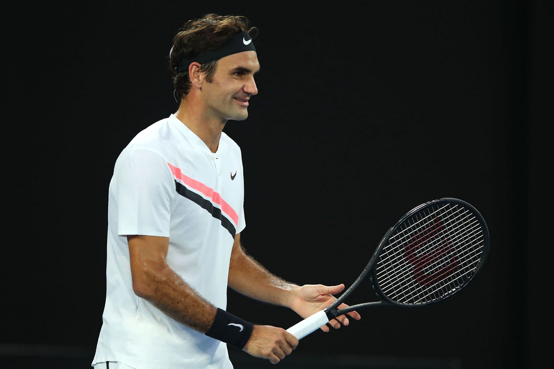 Roger Federer looks on at the 2018 Australian Open