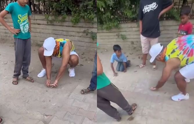 [Watch] Rishabh Pant plays 'kanche' game with kids on street