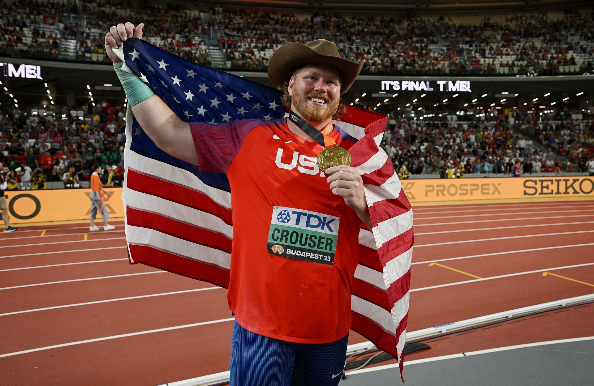 Ryan Crouser reacts after winning a Gold Medal in the Men&#039;s Shot Put during the World Athletics Championships in Budapest, Hungary.
