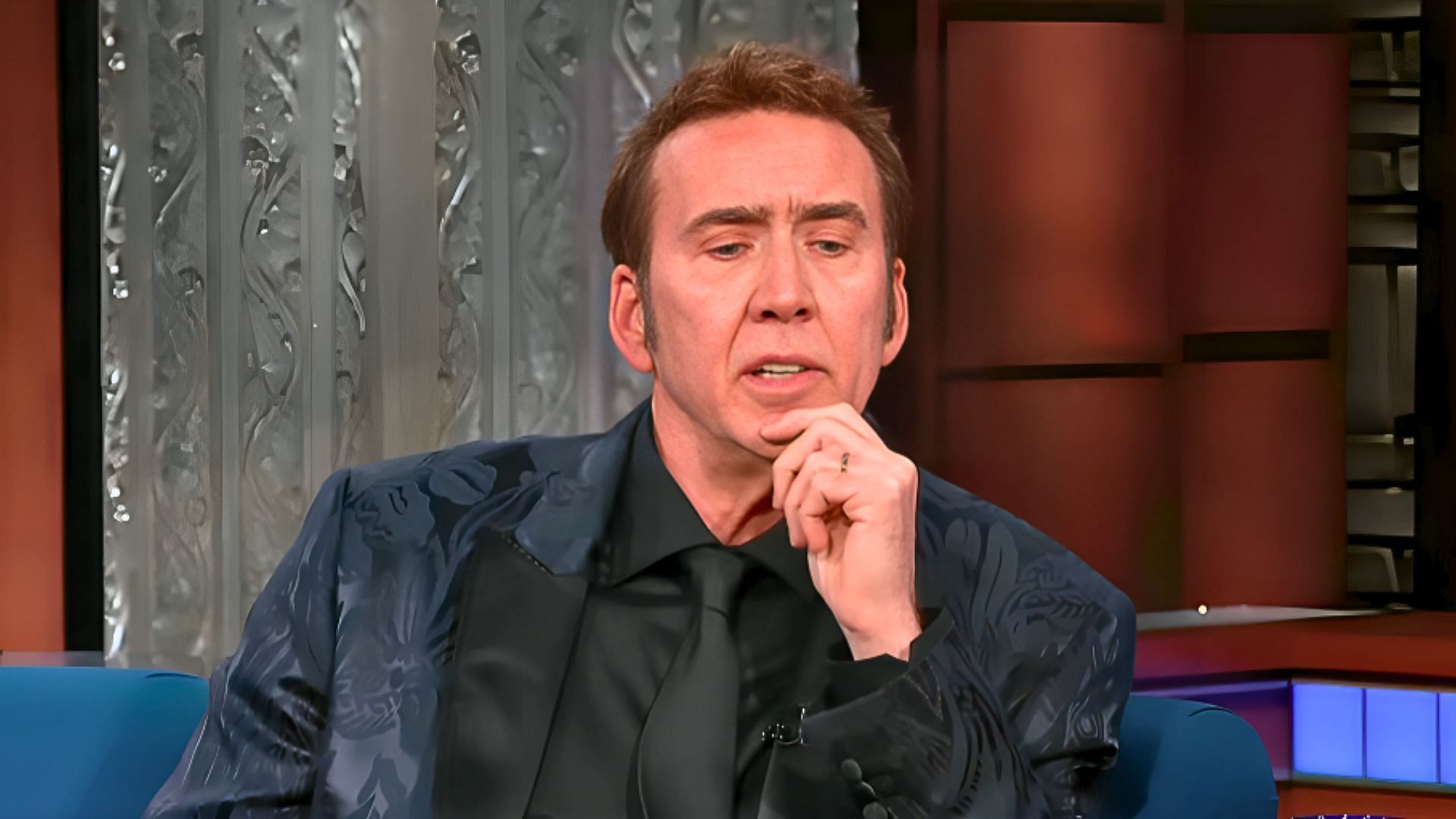Actor Nicolas Cage attended the Oscars 2024 presented the award for Best Actor (Image via YouTube/The Late Show with Stephen Colbert, 2:53)