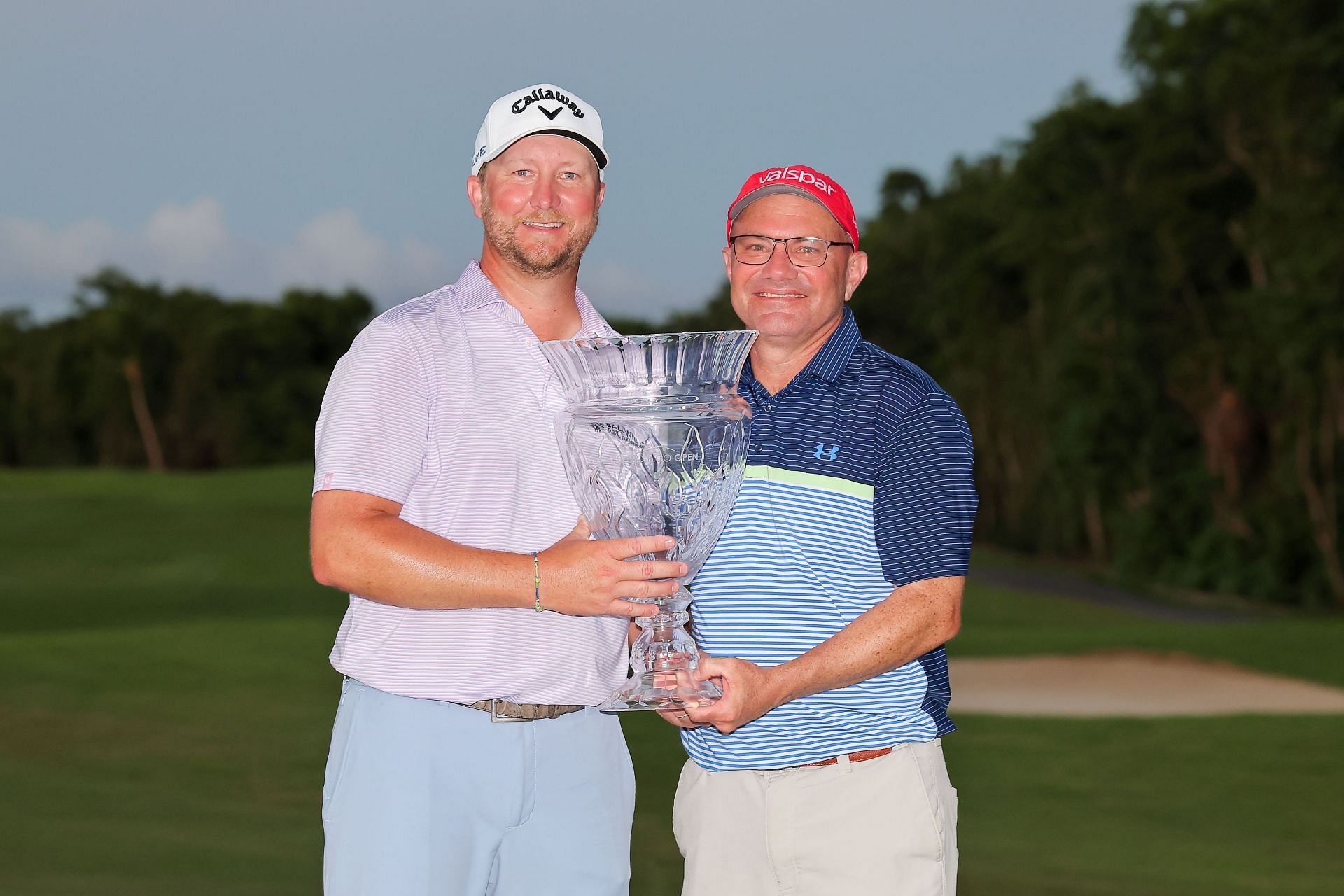 Brice Garnett and caddie Chris Callas celebrate after winning the 2024 Puerto Rico Open