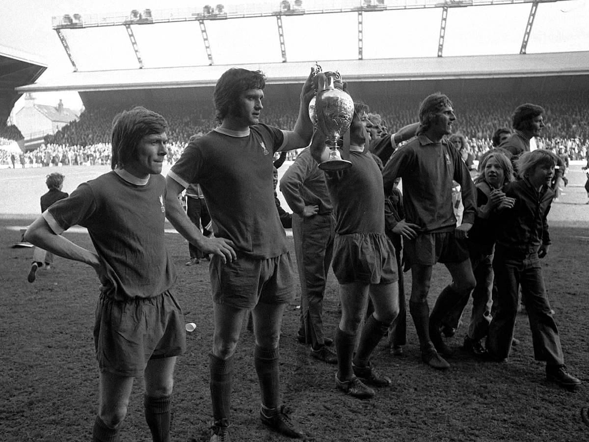 Lloyd (second from left) holding the cup for the First Division title in 1973 (Image via LFC)