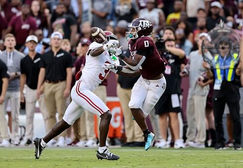 Terrion Arnold #3 of the Alabama Crimson Tide breaks up a pass intended for Ainias Smith #0 of the Texas A&M Aggies