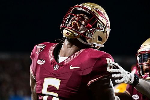 Jaheim Bell #6 of the Florida State Seminoles reacts after running in a 4-yard touchdown in the fourth quarter against the LSU Tigers