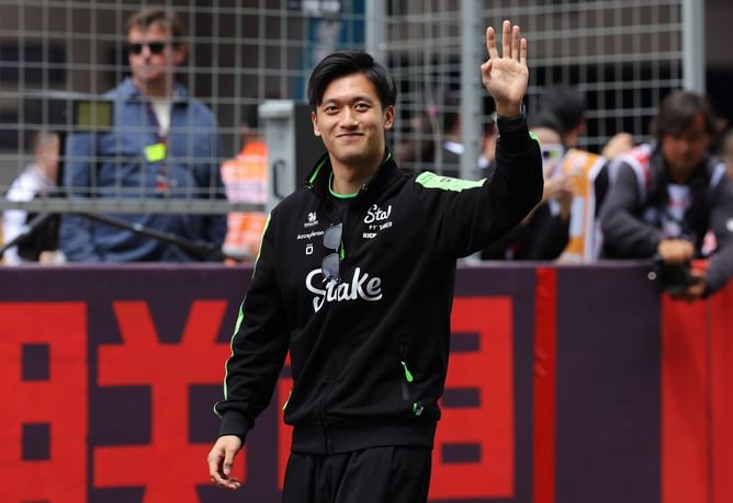 Watch: Zhou Guanyu crying as he receives a standing ovation from the fans at the F1 Chinese GP