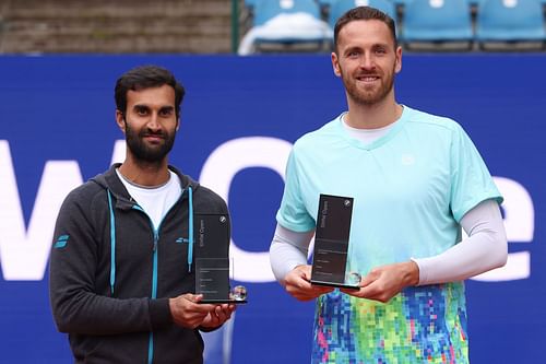 Yuki Bhambari and Albano Olivetti with the BMW Open trophy earlier this month