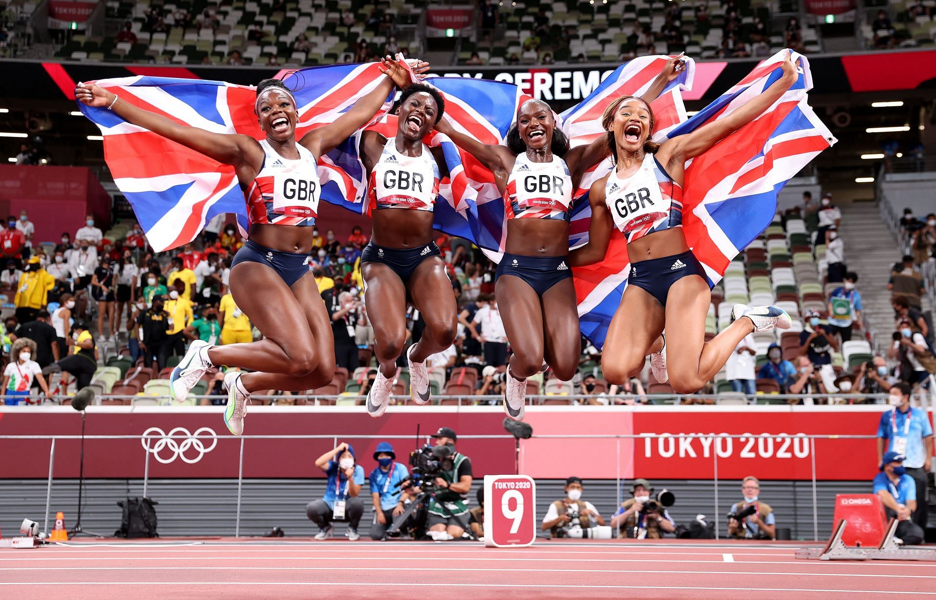 Asha Philip, Imani Lansiquot, Dina Asher-Smith and Daryll Neita of Team Great Britain celebrate winning the bronze medal in the Women&#039;s 4 x 100m Relay Final on day fourteen of the Tokyo 2020 Olympic Games at Olympic Stadium on August 06, 2021 in Tokyo, Japan. (Photo by Michael Steele/Getty Images)