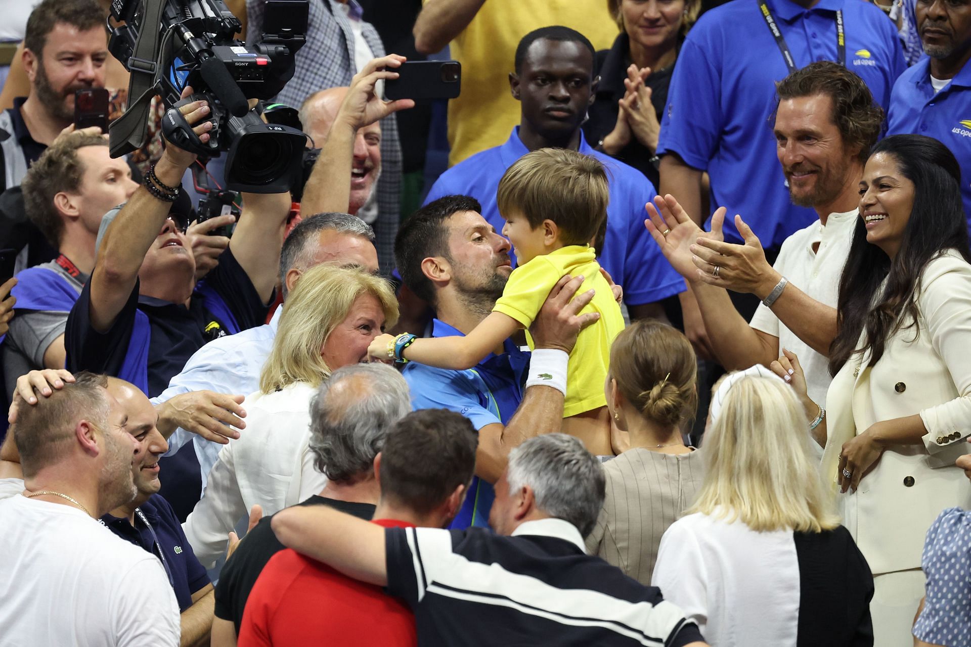 Novak Djokovic embracing his son Stefan