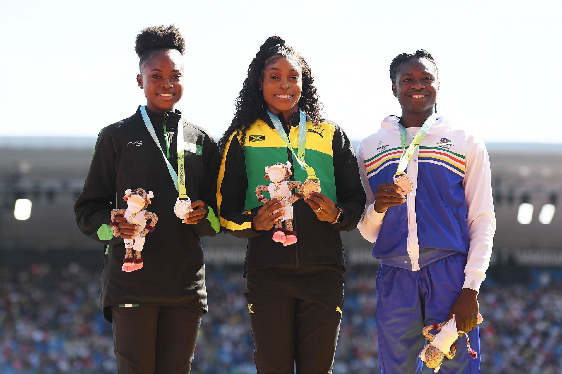 Favour Ofili (L), Elaine Thompson-Herah (C), Christine Mboma (R) pose for a photo during the medal ceremony for the Women&#039;s 200m Final at 2022 Commonwealth Games. (Photo by Tom Dulat/Getty Images)