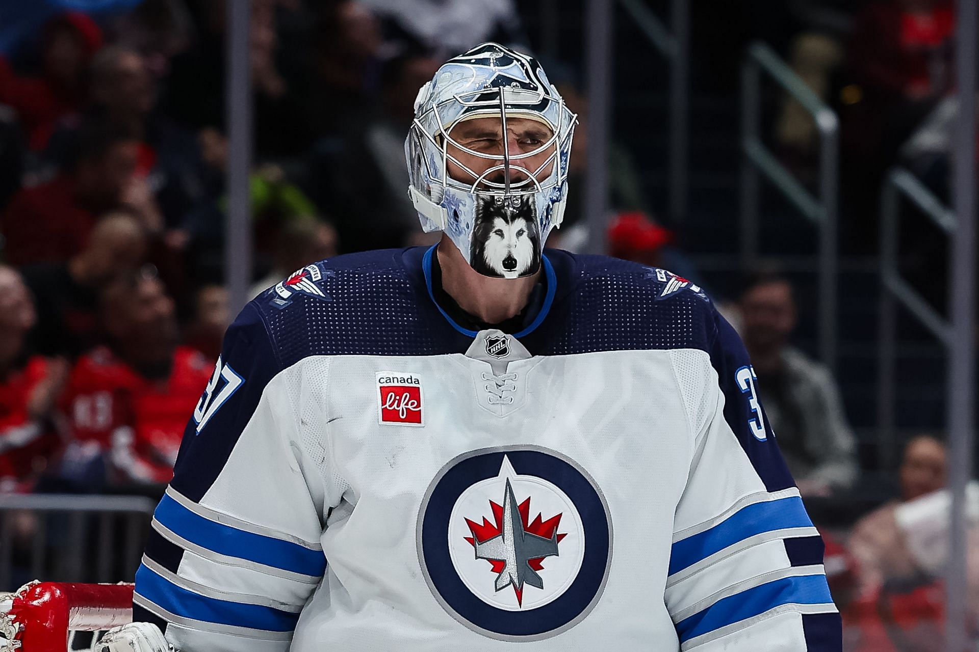 Connor Hellebuyck is leading the Jets