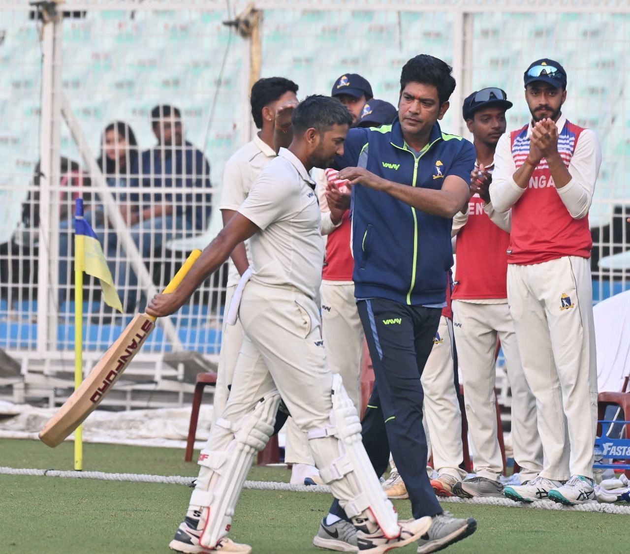 Anustup Majumdar is applauded off the field after his 108* versus Mumbai