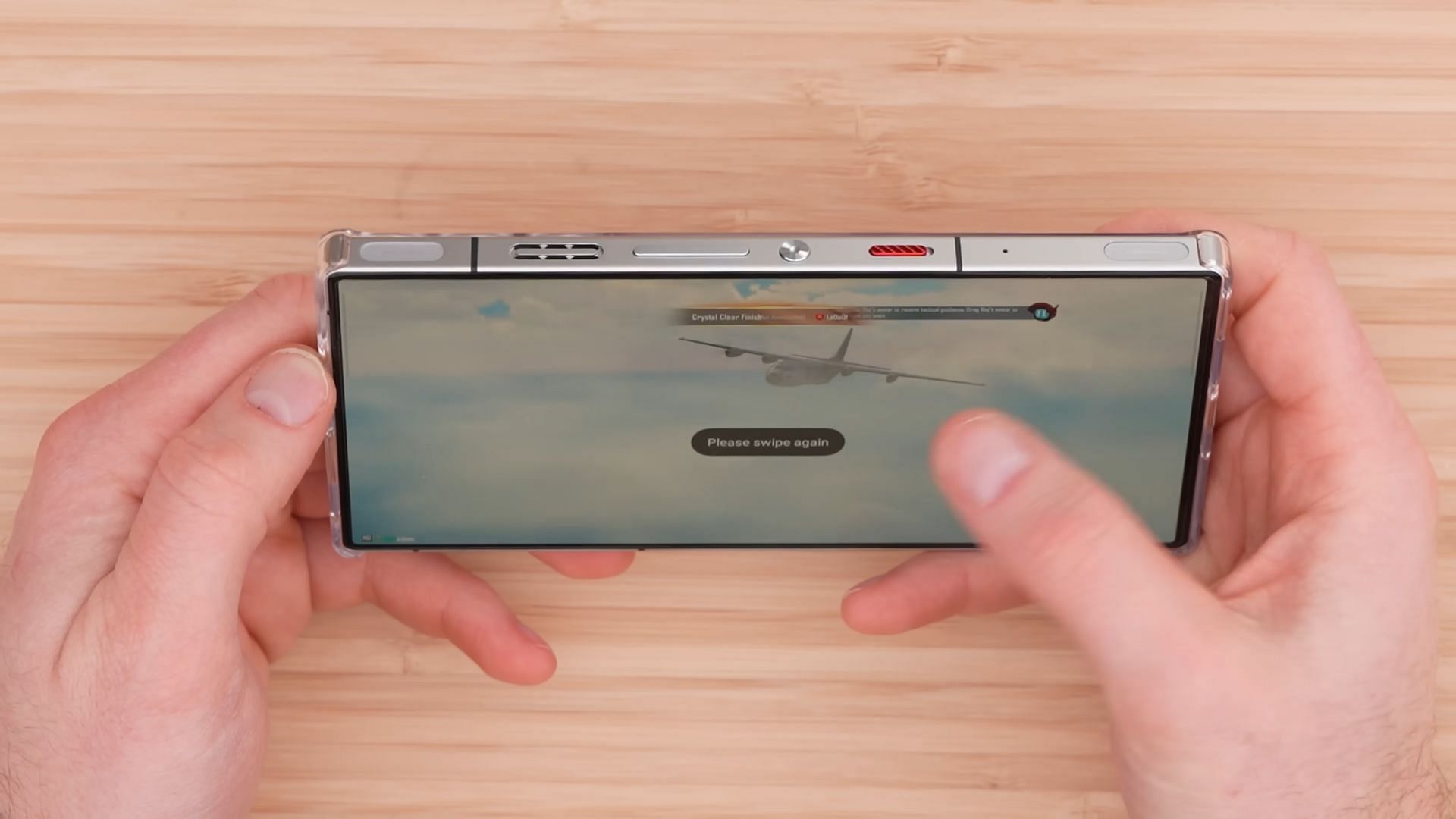 ZTE Red Magic phone with shoulder trigger buttons on the top of the phone (Image via Unbox Therapy/YouTube)