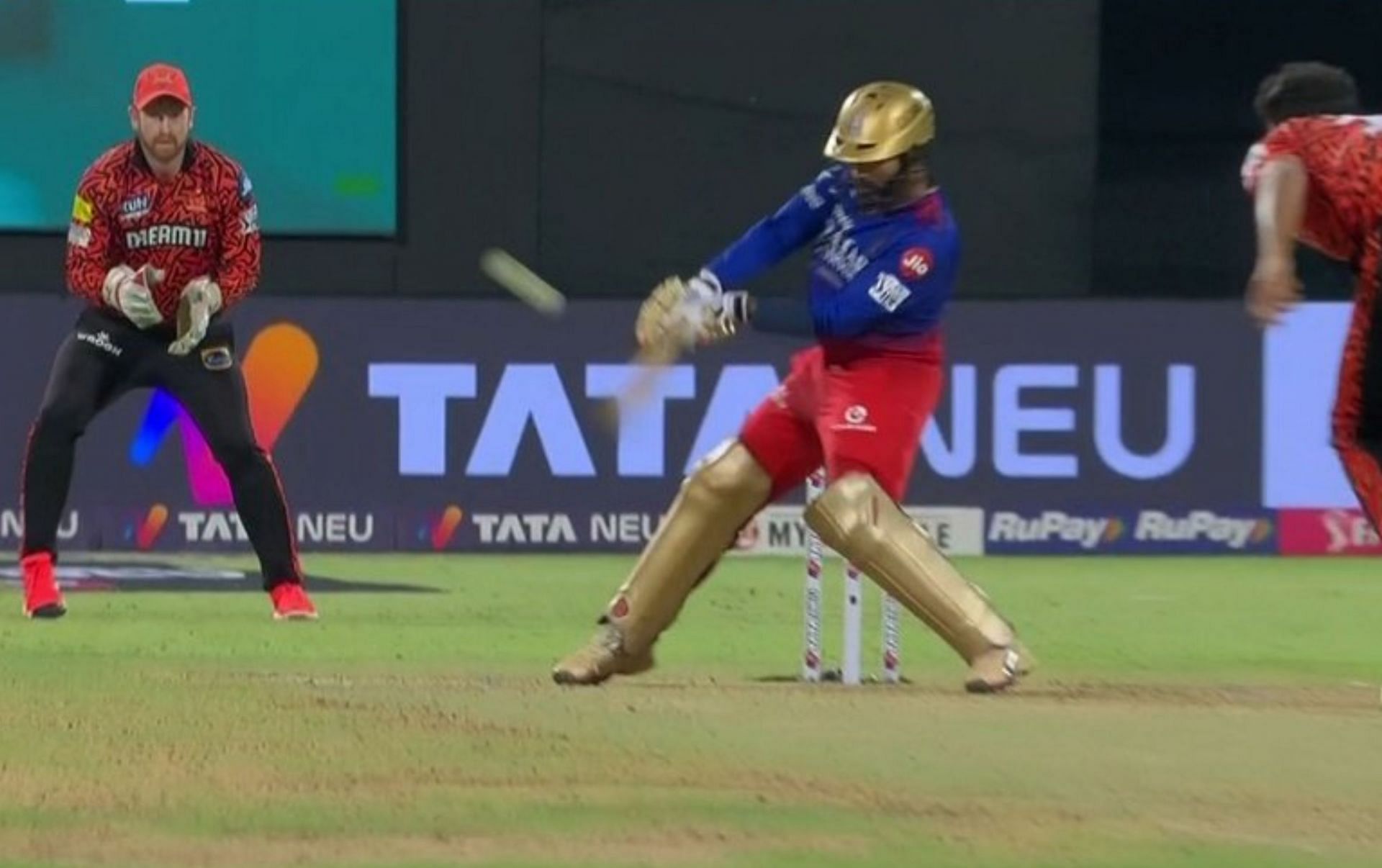 Dinesh Karthik hitting a six against Bhuvneshwar Kumar during Monday