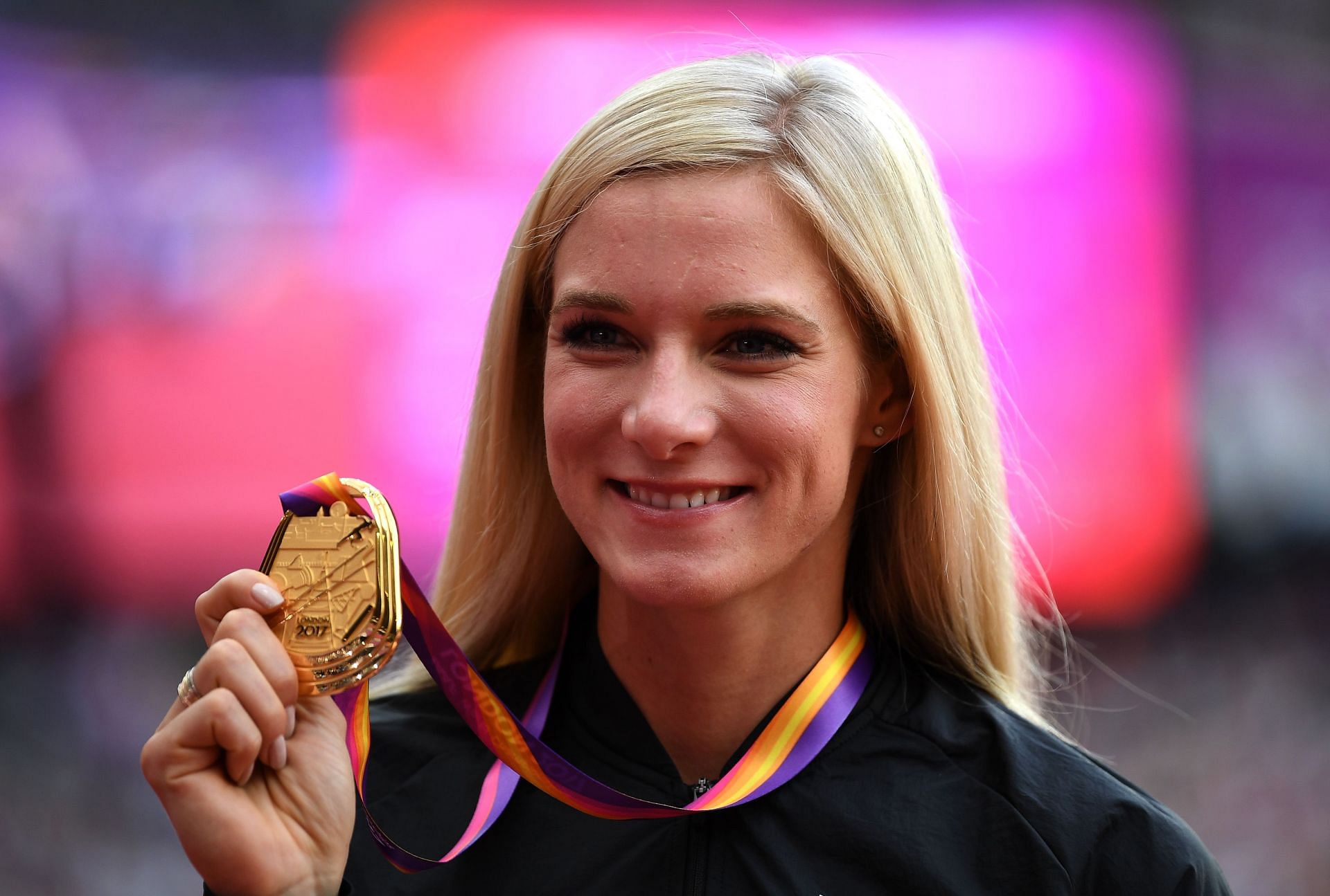 Emma Coburn poses with her gold medal for the Women&#039;s 3000 metres Steeplechase at the 16th IAAF World Athletics Championships London 2017 in London, United Kingdom. (Photo by Matthias Hangst/Getty Images)