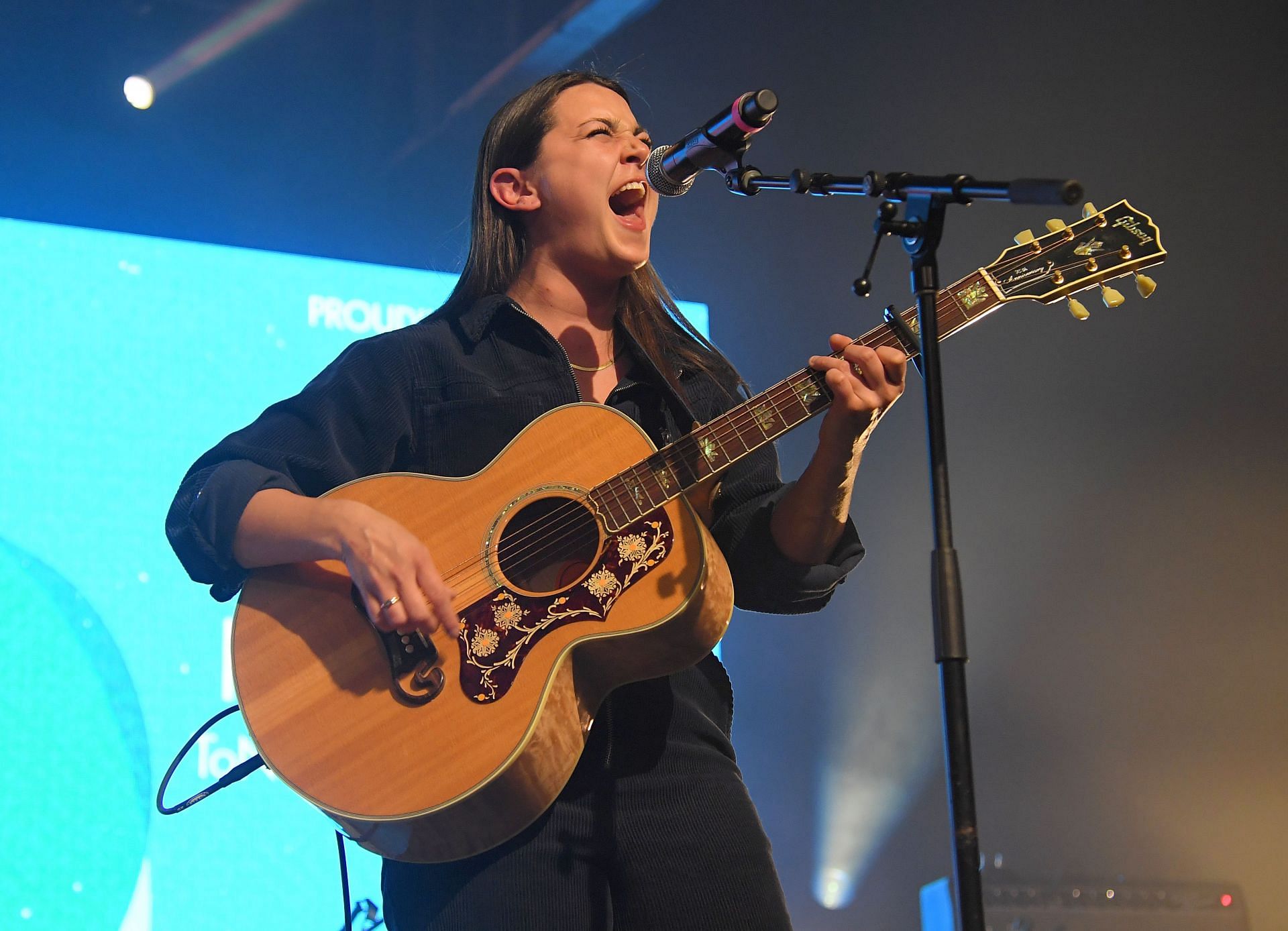 Katie performing at To Nashville, With Love A Concert Benefiting Local Tornado Relief Efforts. (Photo by Jason Kempin/Getty Images)