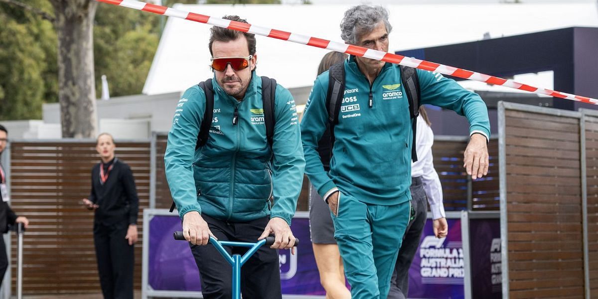 Fernando Alonso of Spain and Aston Martin rides his scooter into the circuit prior to the qualifying ahead of the F1 Grand Prix of Australia at Albert Park Circuit on March 23, 2024 in Melbourne, Australia.(Photo by Bill Murray/Getty Images)