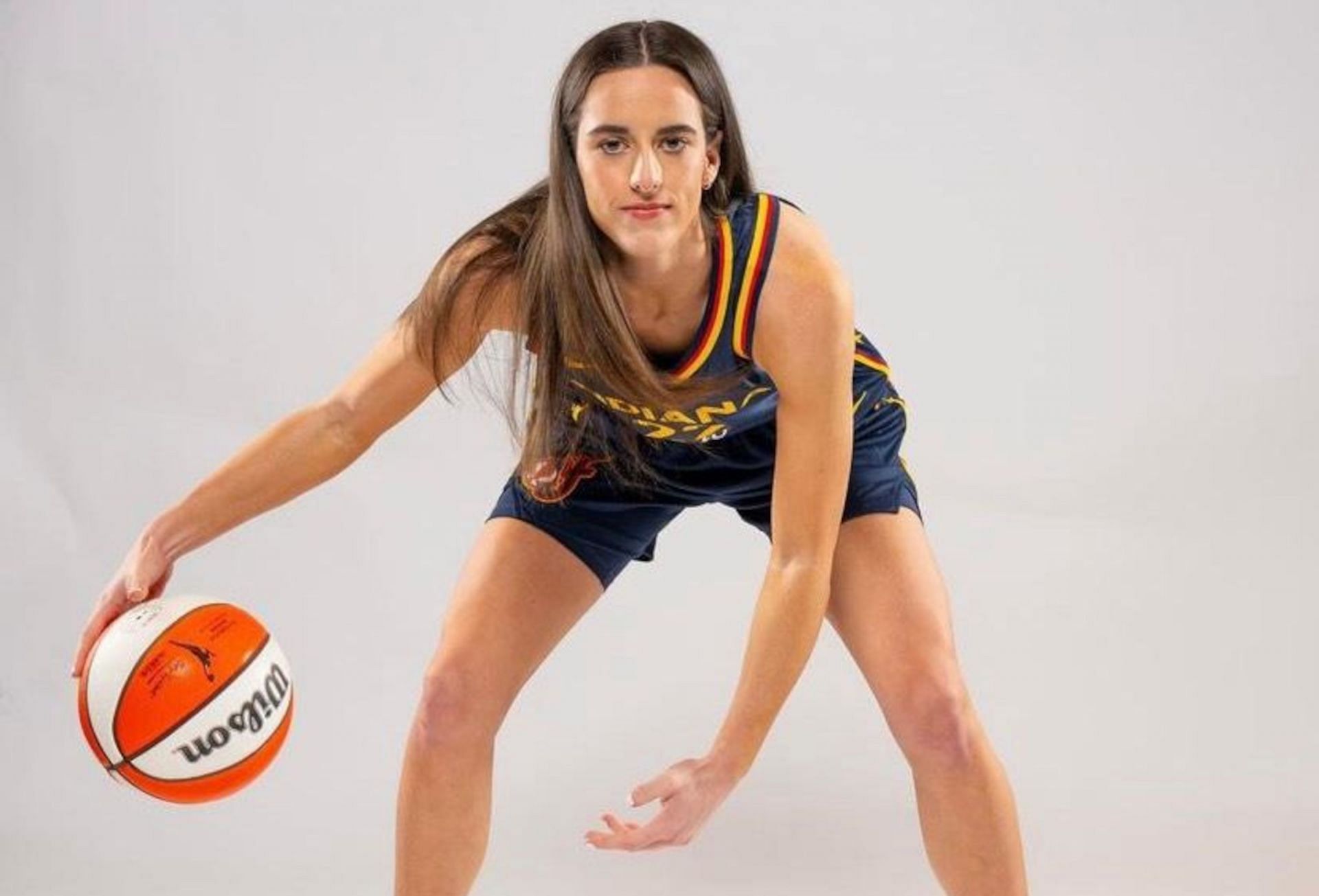Rookie Caitlin Clark wearing her new Indiana Fever threads.