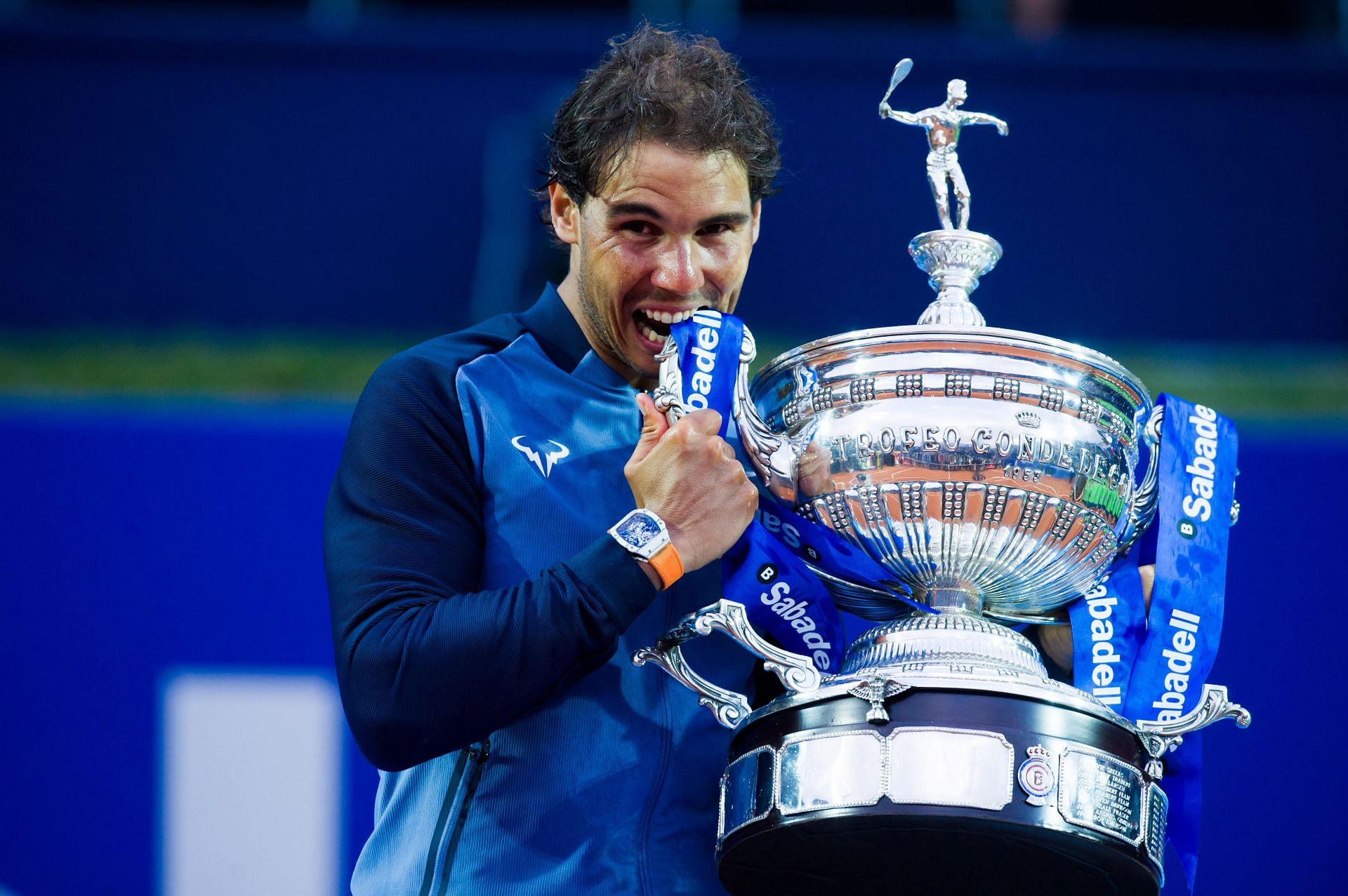 The Spanish bull poses with the 2016 Barcelona Open trophy
